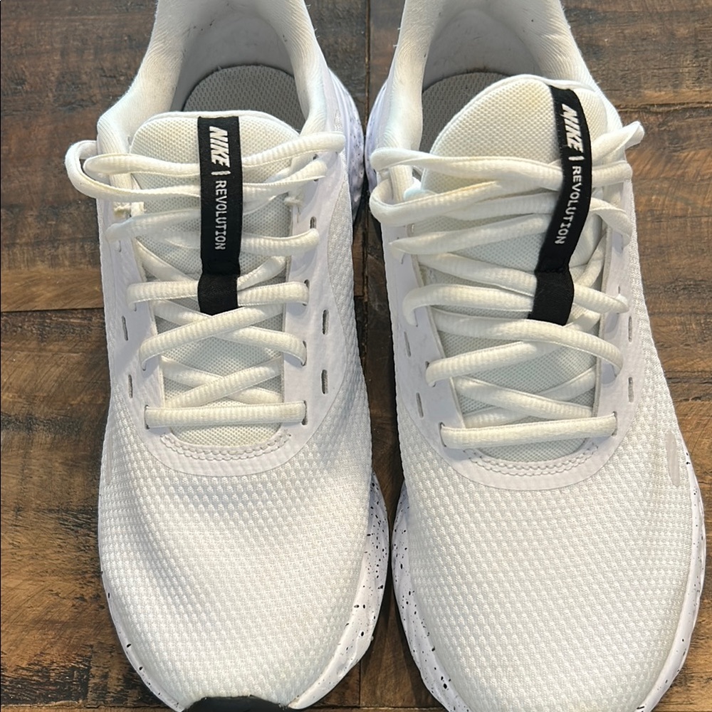 Nike Revolution women’s size 8 White Running Shoes